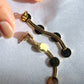ELEGANT CIRCLES SERPENT EARRINGS